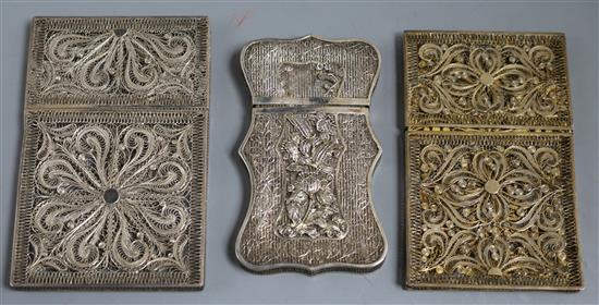 Three 19th century silver filigree work card cases largest 10 x 6.5cm